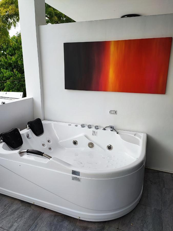 Bonsai Jacuzzi Suites Panglao City Exterior foto