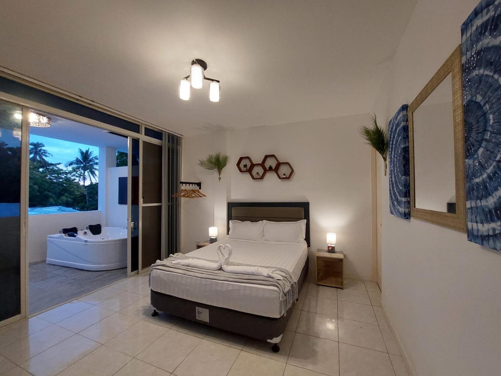 Bonsai Jacuzzi Suites Panglao City Exterior foto